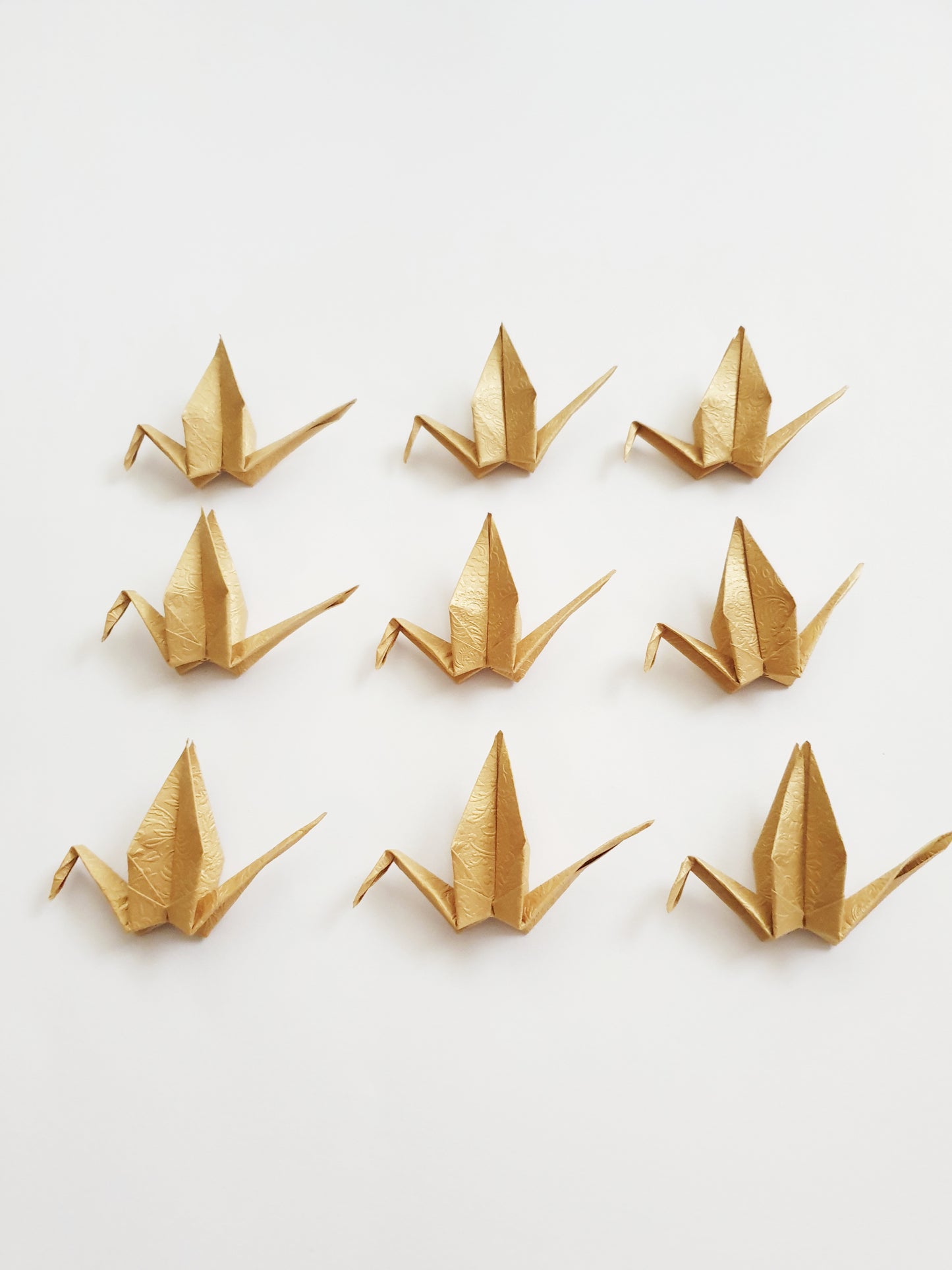 The Golden Origami Cranes