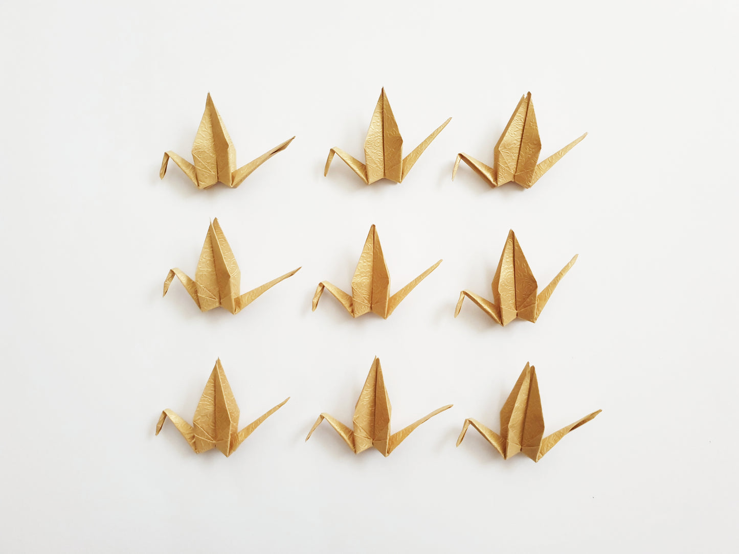 The Golden Origami Cranes