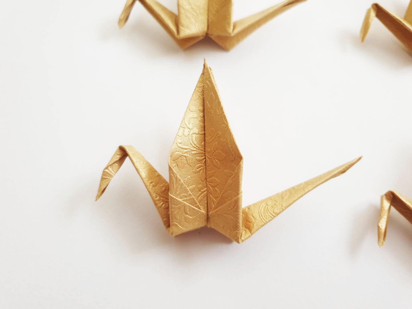 The Golden Origami Cranes