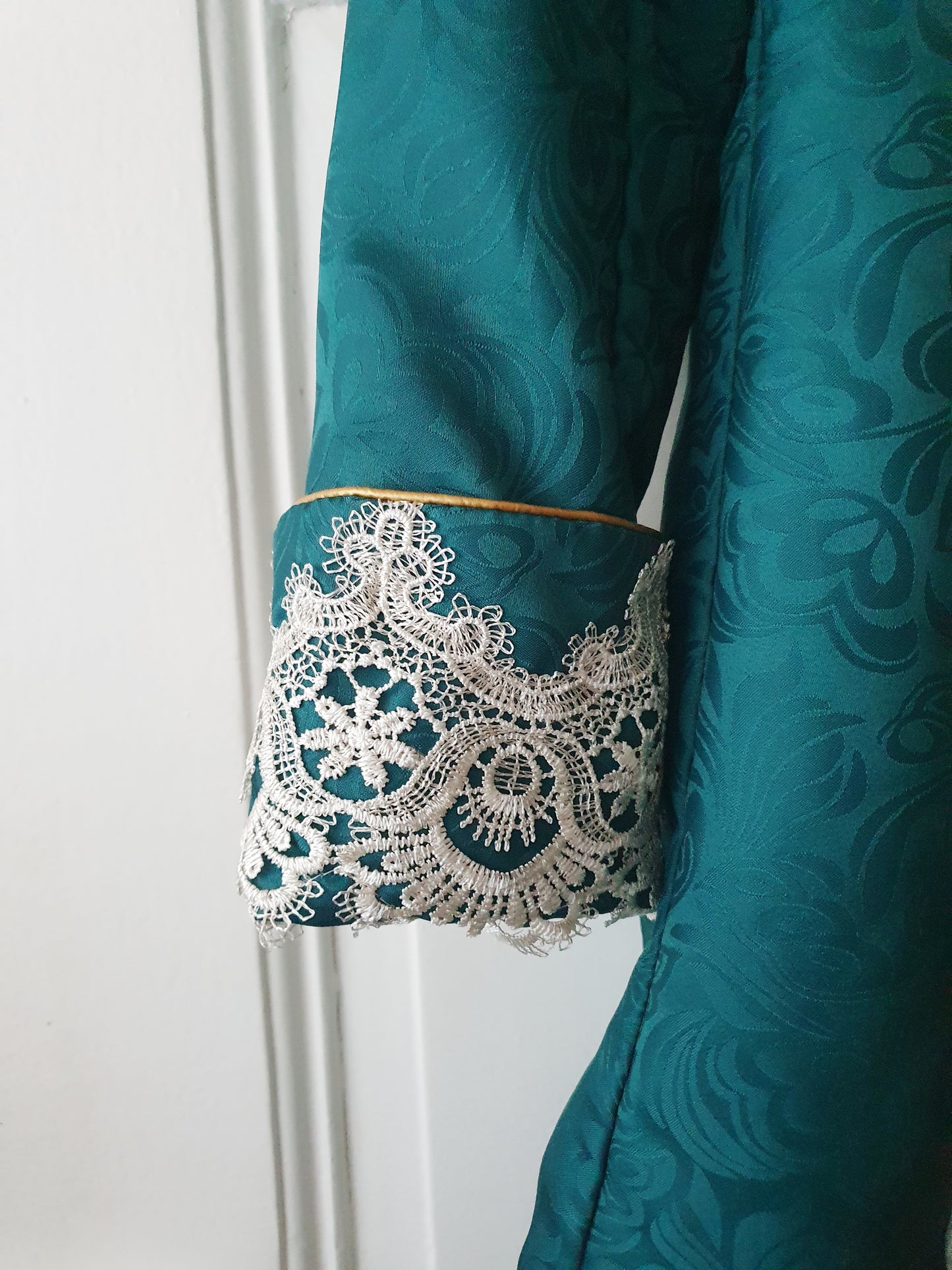The Regal Emerald Lace-Trimmed Jacket